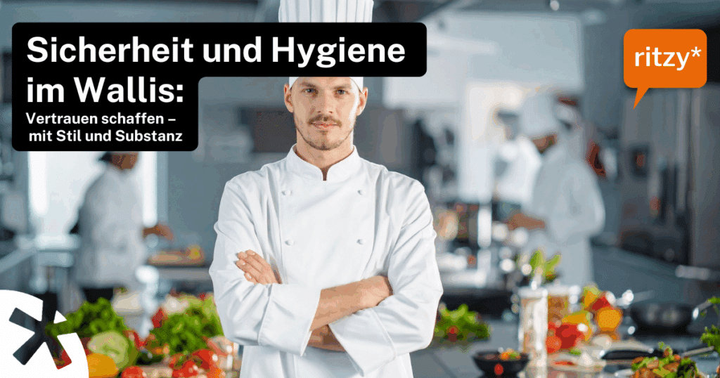 Koch in weisser Uniform steht mit verschränkten Armen in einer professionellen Küche, umgeben von frischem Gemüse und Kochutensilien. Text auf dem Bild: ‚Sicherheit und Hygiene im Wallis: Vertrauen schaffen – mit Stil und Substanz‘, Logo ritzy*